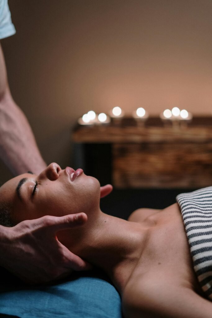 pexels-photo-3997983-3997983 A woman enjoying a relaxing face massage in a tranquil spa setting.